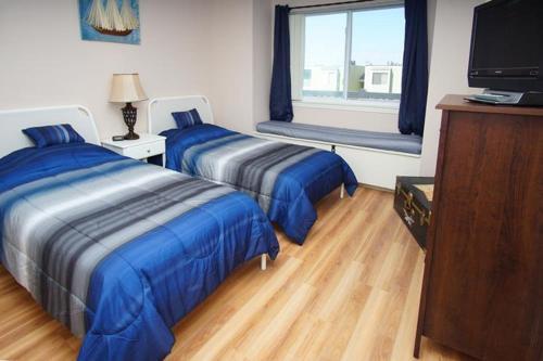 Apartamento Raintree Condo 2h