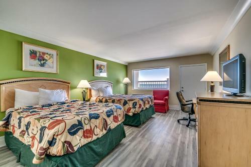 Posada Beachcomber Inn & Suites