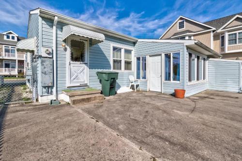 Blue Cottage By The Sea