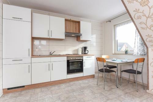 Apartamento Ferienwohnungen An Deck