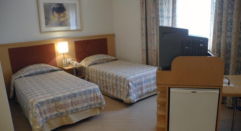 Hotel Bienal Su�tes