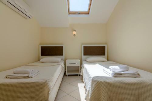 Apollonium Beach Flats And Villas