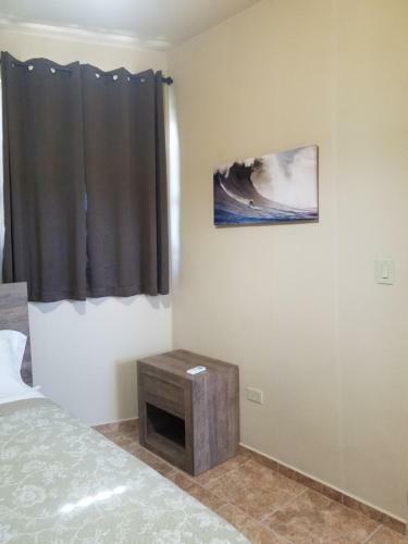 Hostal Tropical Ramey Apartments