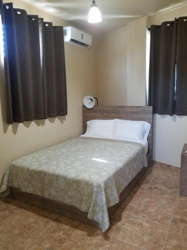 Hostal Tropical Ramey Apartments