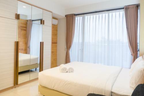 Comfy Studio At Dago Suites Apartment By Travelio
