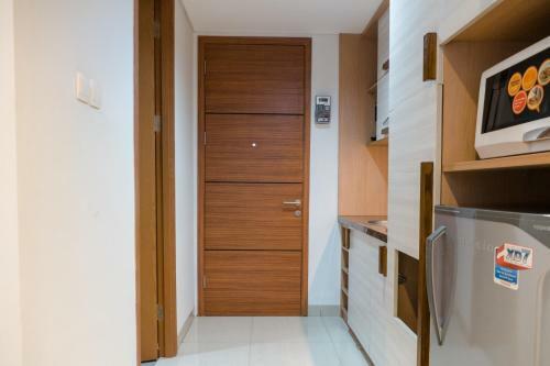 Comfy Studio At Dago Suites Apartment By Travelio