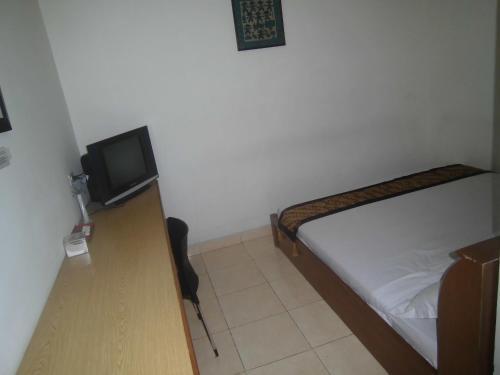 Hostal Rumah Tawa Guesthouse - 1