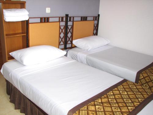 Hostal Rumah Tawa Guesthouse - 1