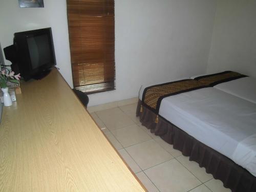 Hostal Rumah Tawa Guesthouse - 1
