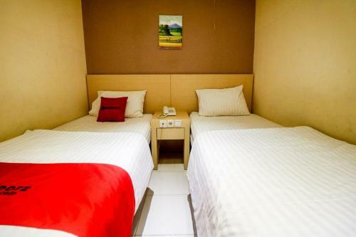 Hotel Reddoorz Pasar Tarapung Siring