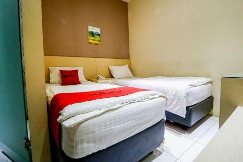 Hotel Reddoorz Pasar Tarapung Siring