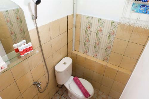 2br Pino Green Pramuka Apartment By Travelio