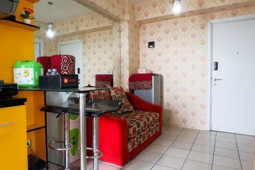 2br Pino Green Pramuka Apartment By Travelio