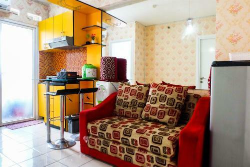 2br Pino Green Pramuka Apartment By Travelio