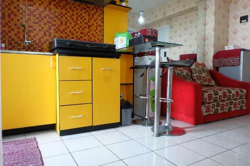 2br Pino Green Pramuka Apartment By Travelio
