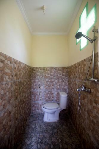 Hostal Parmini Guest House (formerly Internal Pelangi 2 Guesthouse)