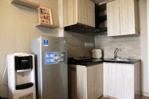 Deluxe And Comfortable 2br The Springlake Summarecon Apartment By Travelio