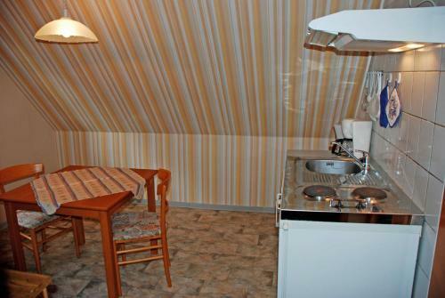 Apartamento Ferienwohnungen Unterm Reetdach Mi