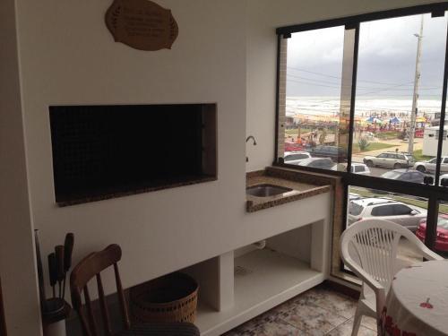 Apartamento Dois Dormit�rios Av. Beira Mar Com Box