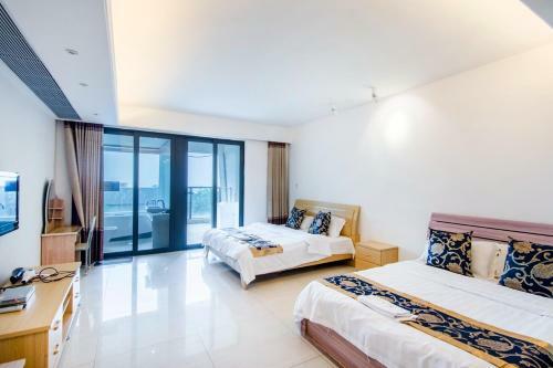 Guanhaige First Line Seaview Apartment