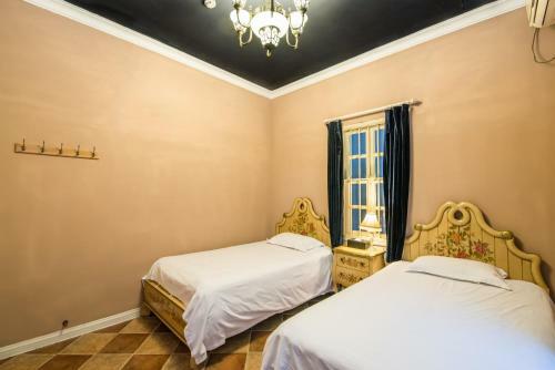 Hostal Gulang Yu Xiaobai Gong Guest House
