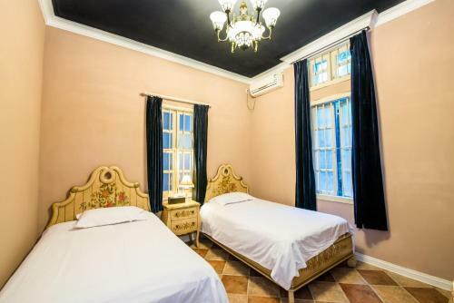 Hostal Gulang Yu Xiaobai Gong Guest House