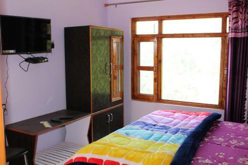 Hostal The Dhanolti Groove Garden