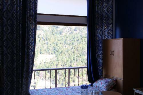 Hostal The Dhanolti Groove Garden