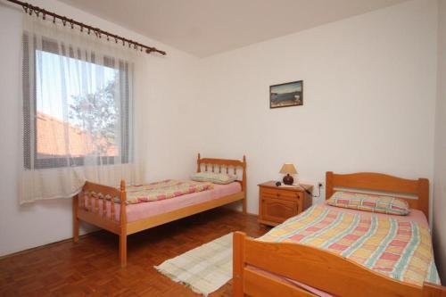 Apartments With A Parking Space Zdrelac (pasman) - 8201
