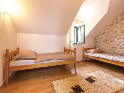 Four-bedroom Holiday Home In Zmijavci