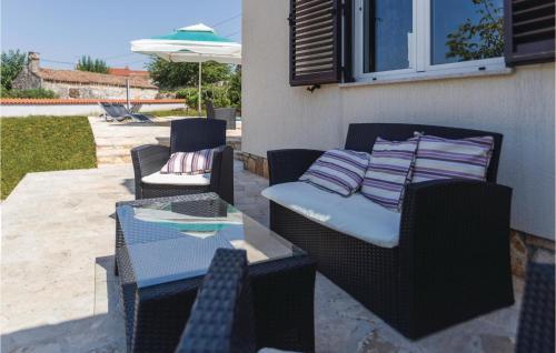 Four-bedroom Holiday Home In Vabriga