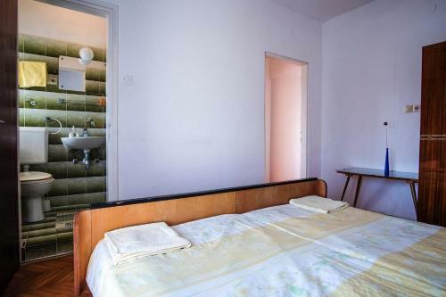 Apartments With A Parking Space Barbat (rab) - 14431