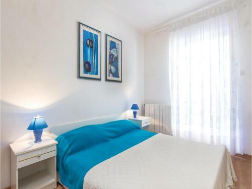 Three-bedroom Apartment In Rabac