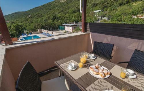 Three-bedroom Apartment In Labin