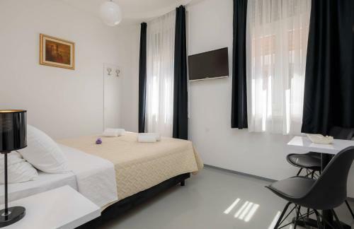 Apartamentos Plr-peristyle Luxury Rooms