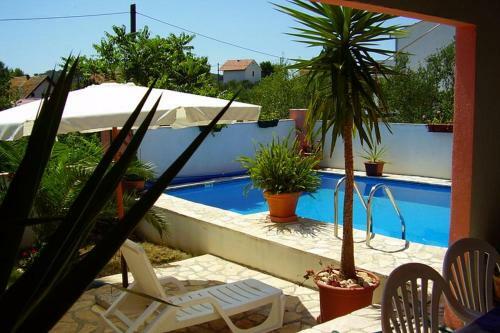 Apartment Maslinica 5180a