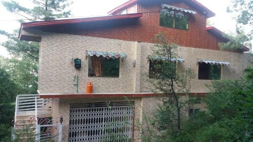 Janjua Lodges & Apartments