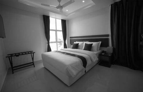 Hostal The White Harp Beach Hotel