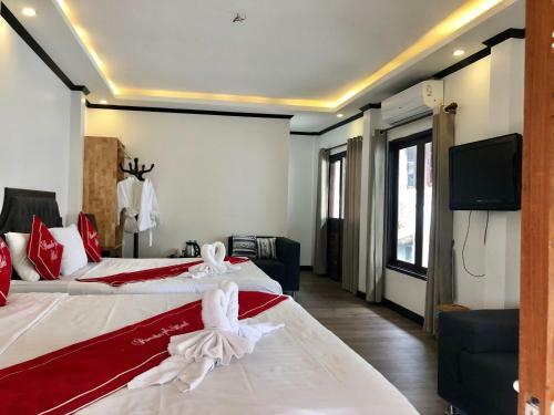 Hostal Oudomsouk City Center
