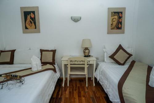 Hostal Frangipani Guesthouse