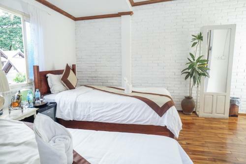 Hostal Frangipani Guesthouse