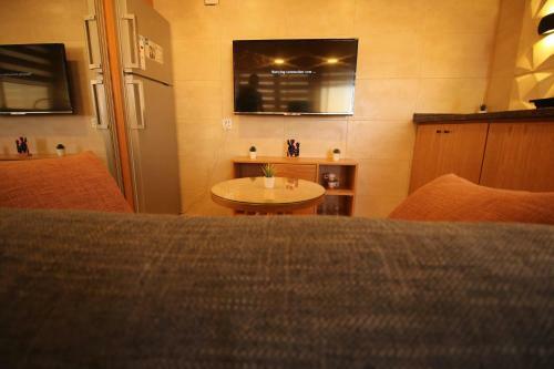 Aqarco Sanar Apartment