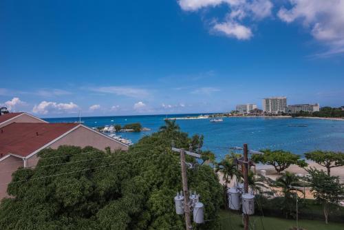 Apartamento Sunwind Ocean View Suite At Turtle Towers