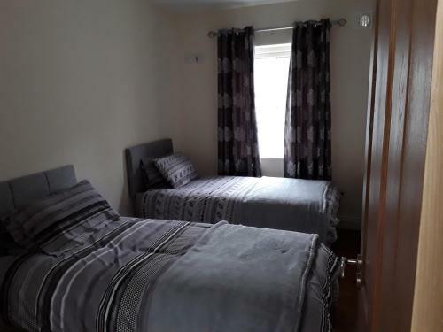 Apartamento Burkes Of Ballycastle Accommodation