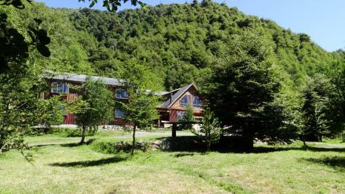 Hostal Y Caba�as "el Coig�e"