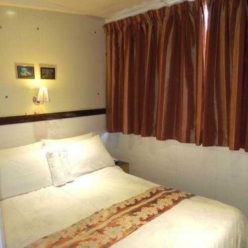 Hostal Hotel Guan Zhou