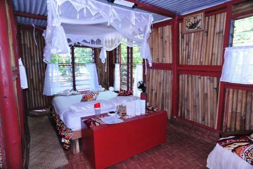 Hostal Dolphin Bay Divers Retreat