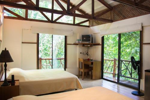 Hotel Portasol Rainforest & Ocean View Community