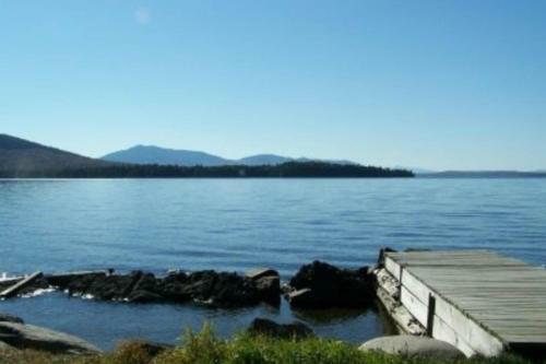 Rustic Camp On Water's Edge