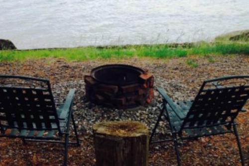 Rustic Camp On Water's Edge